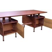 Vintage 1950s teak desk by designer Jacques Hauville.