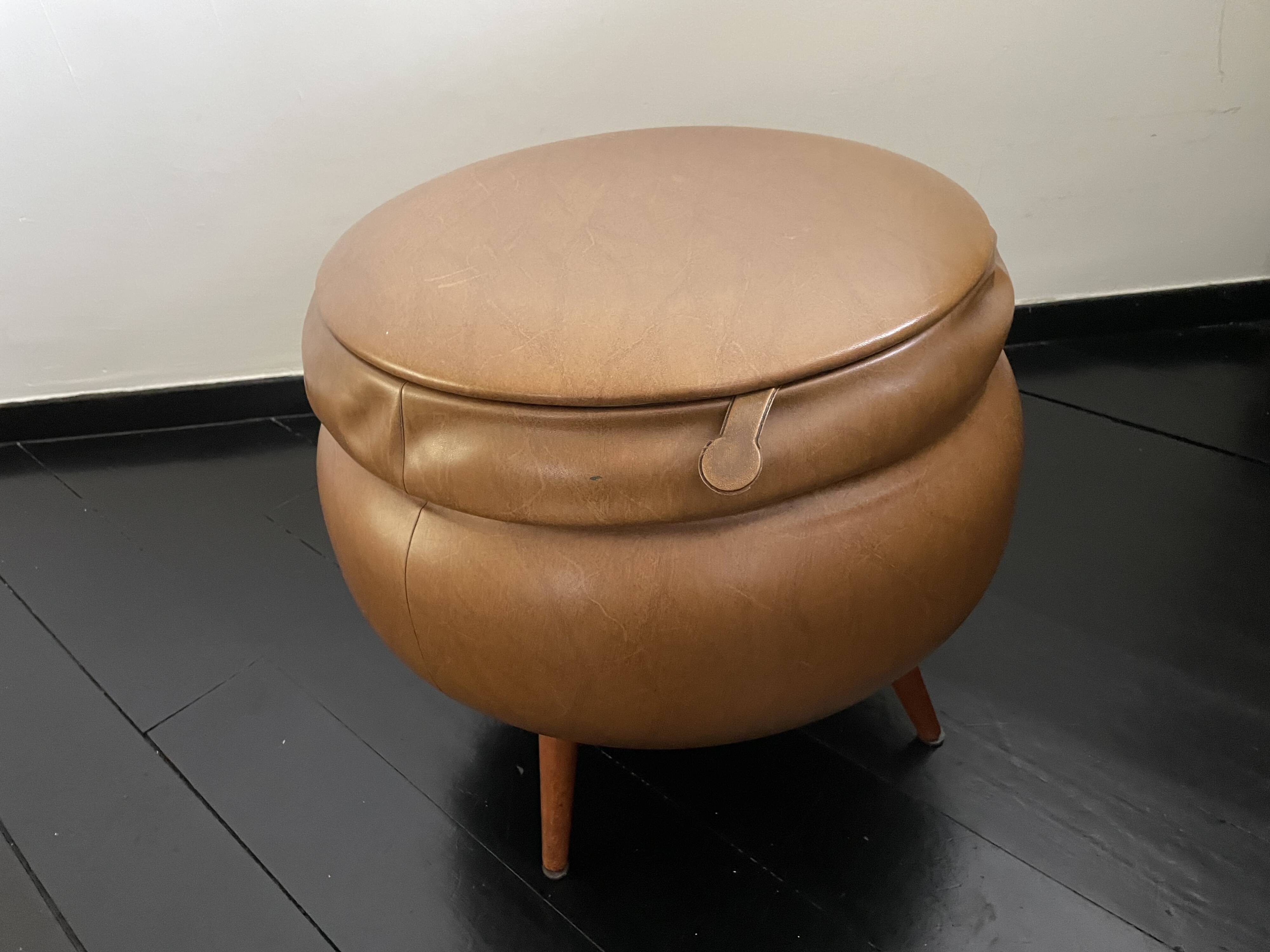 Light brown leather pouf with storage
