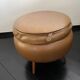 Light brown leather pouf with storage
