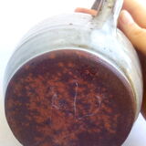 Sarthois pitcher in grey sandstone and rust effect