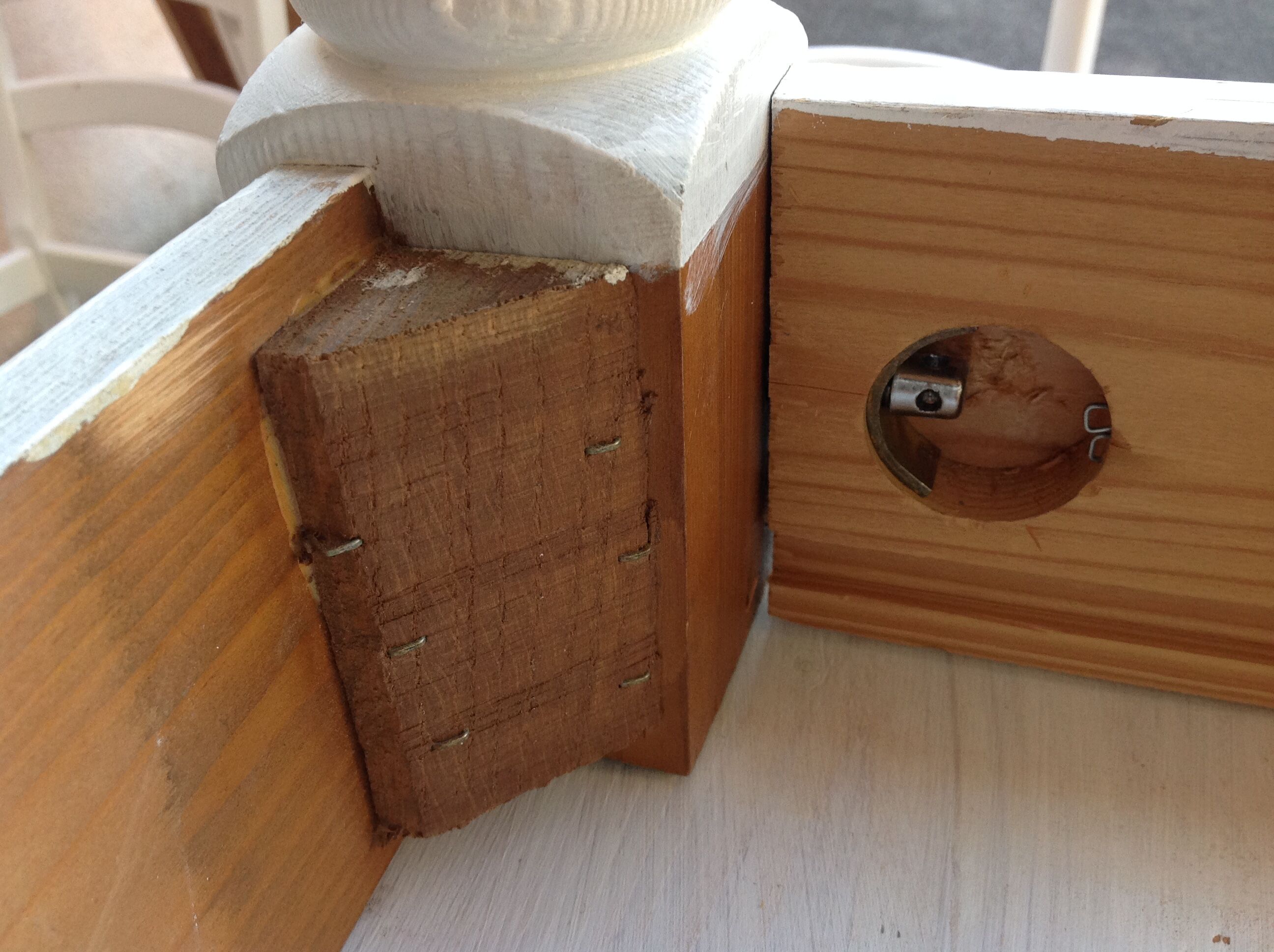 White farmhouse table set and four chairs
