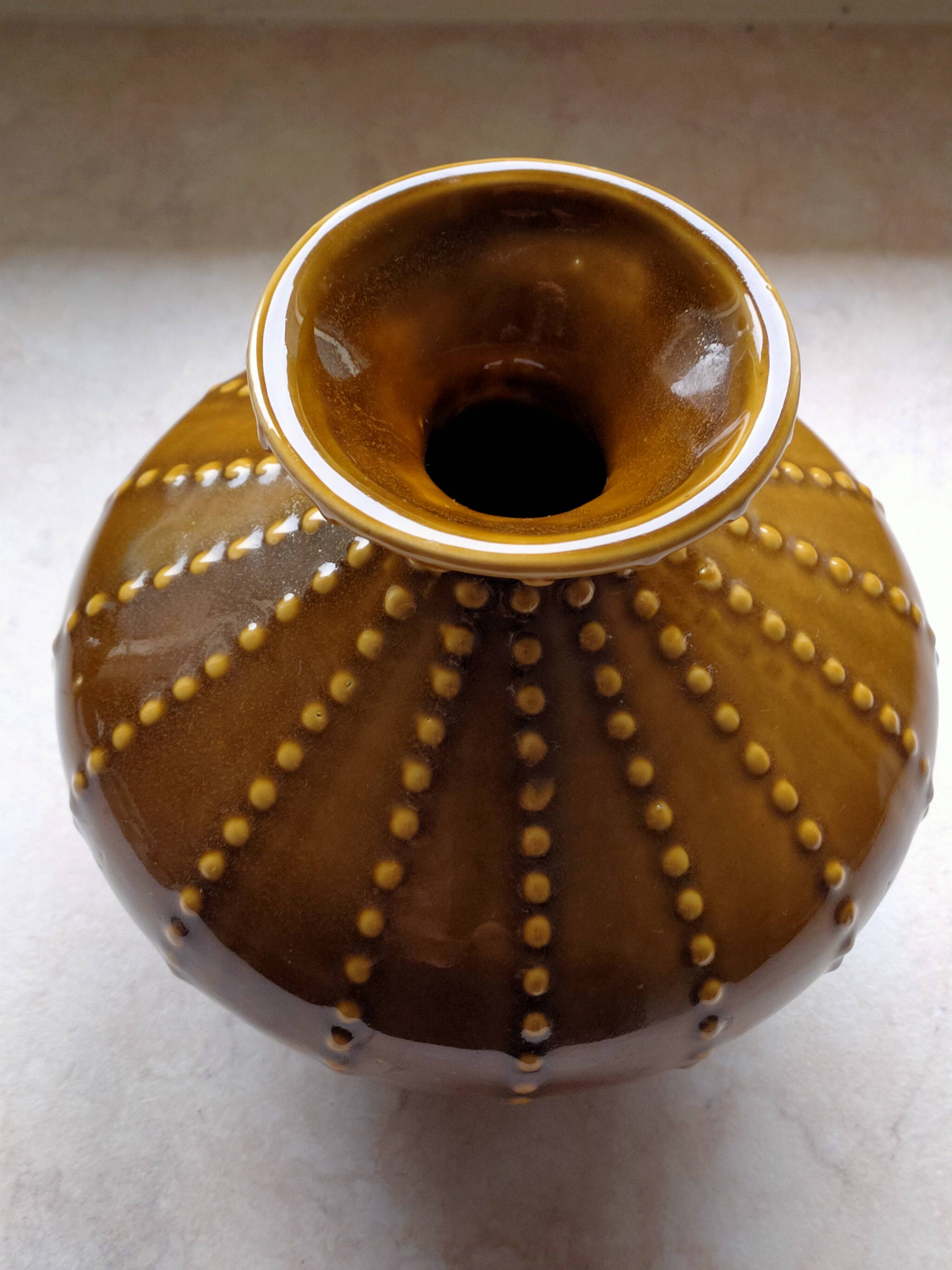 Pear-shaped ceramic vase.