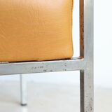 Modernist armchair in chromed metal and imitation leather, 50s/60s