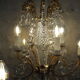 Chandelier 12 lamps with grapevines in crystal, bronze and regulated