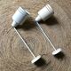 White metal wall sconces