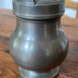 Tin pot with lid