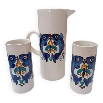 Carafe and two glasses with blue fish motifs