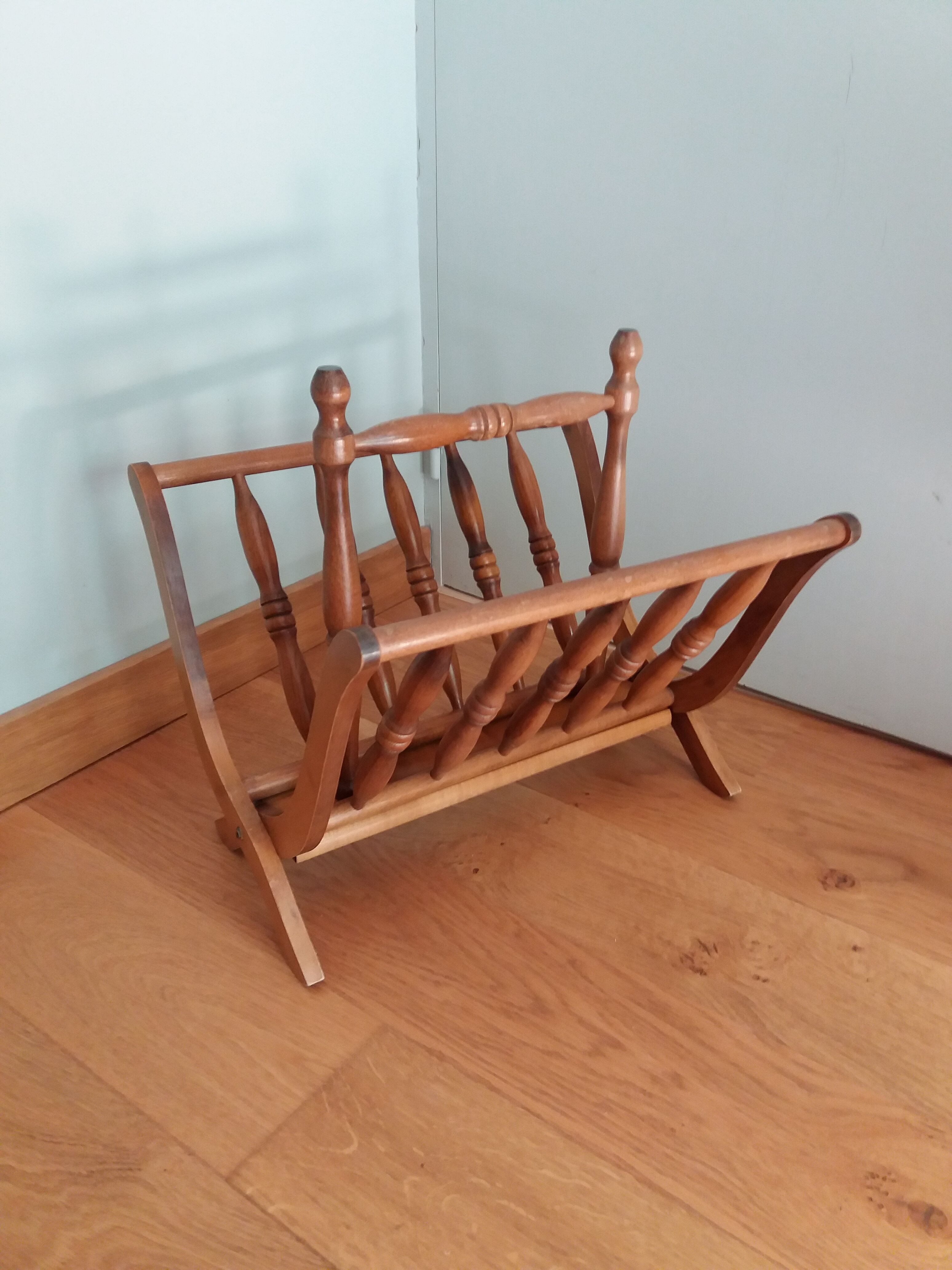 Turned wooden magazine holder