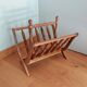 Turned wooden magazine holder
