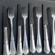 12 Forks and 12 cheese or dessert knives – Orfèvrerie Perrin Paris
