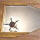 Antique Art Deco mercury mirror, in carved wood with gold leaf.
