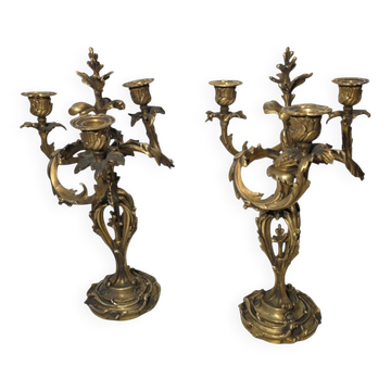 Pair of Louis XV style bronze candlesticks from the 19th century.