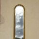 Hallway mirror, gilded frame, curtains and fleur-de-lis