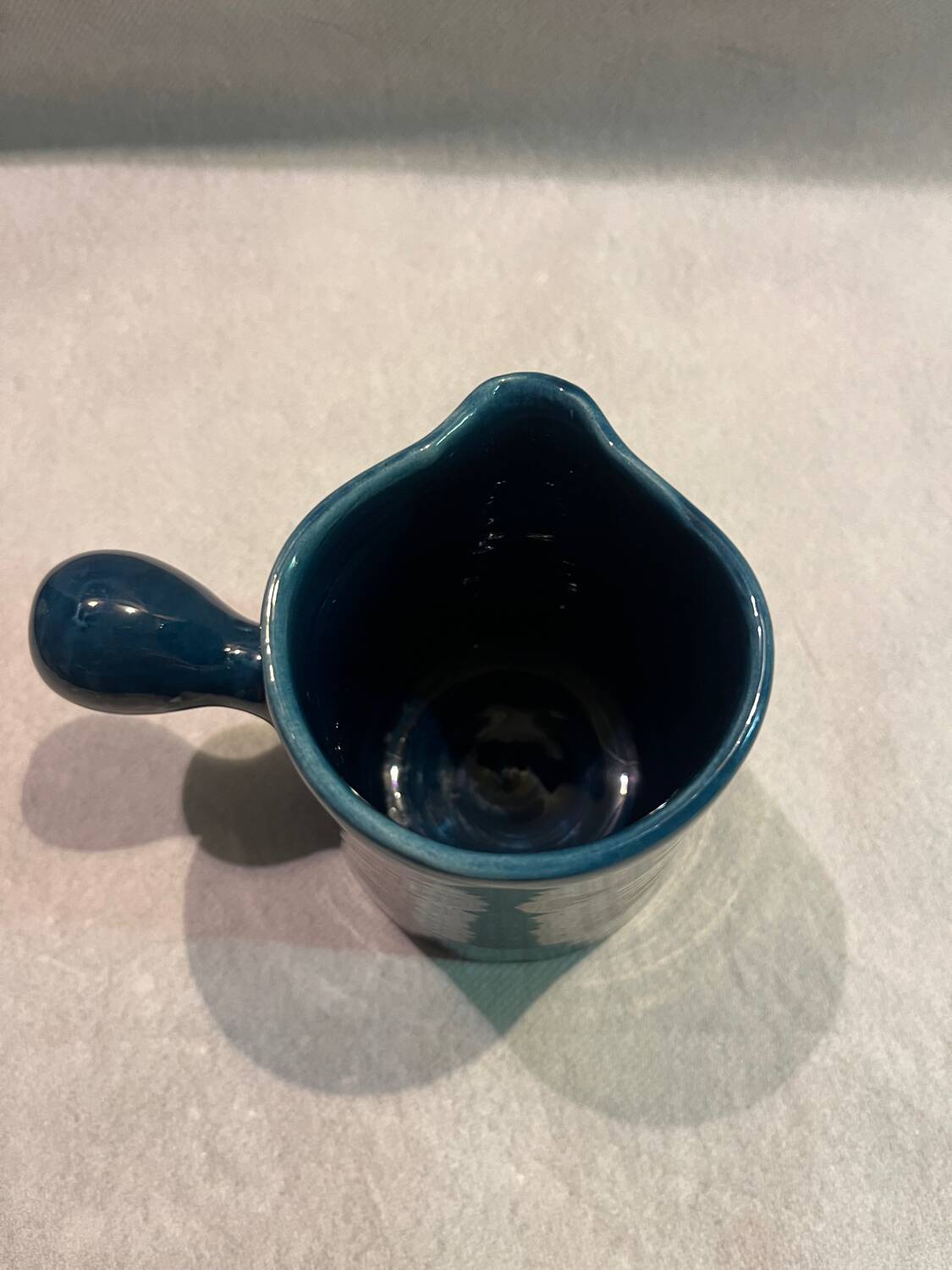 Blue ceramic milk jug