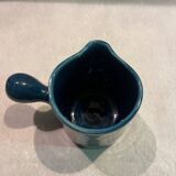 Blue ceramic milk jug