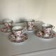 4 tea cups and saucers in shabby pink porcelain