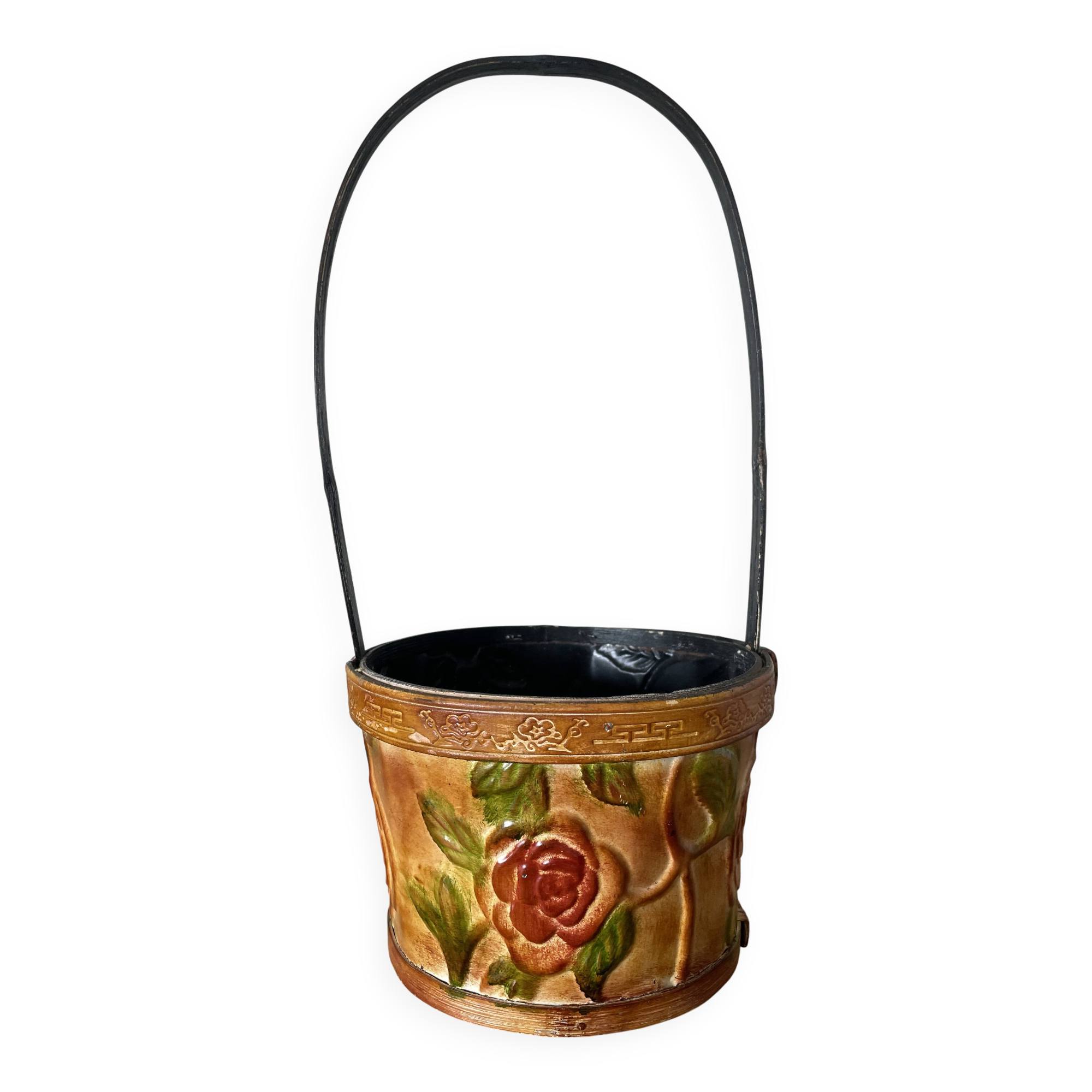 Metal basket with rose patterns