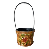 Metal basket with rose patterns