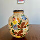 Ceramic vase by J. Massier Vallauris with floral decoration.