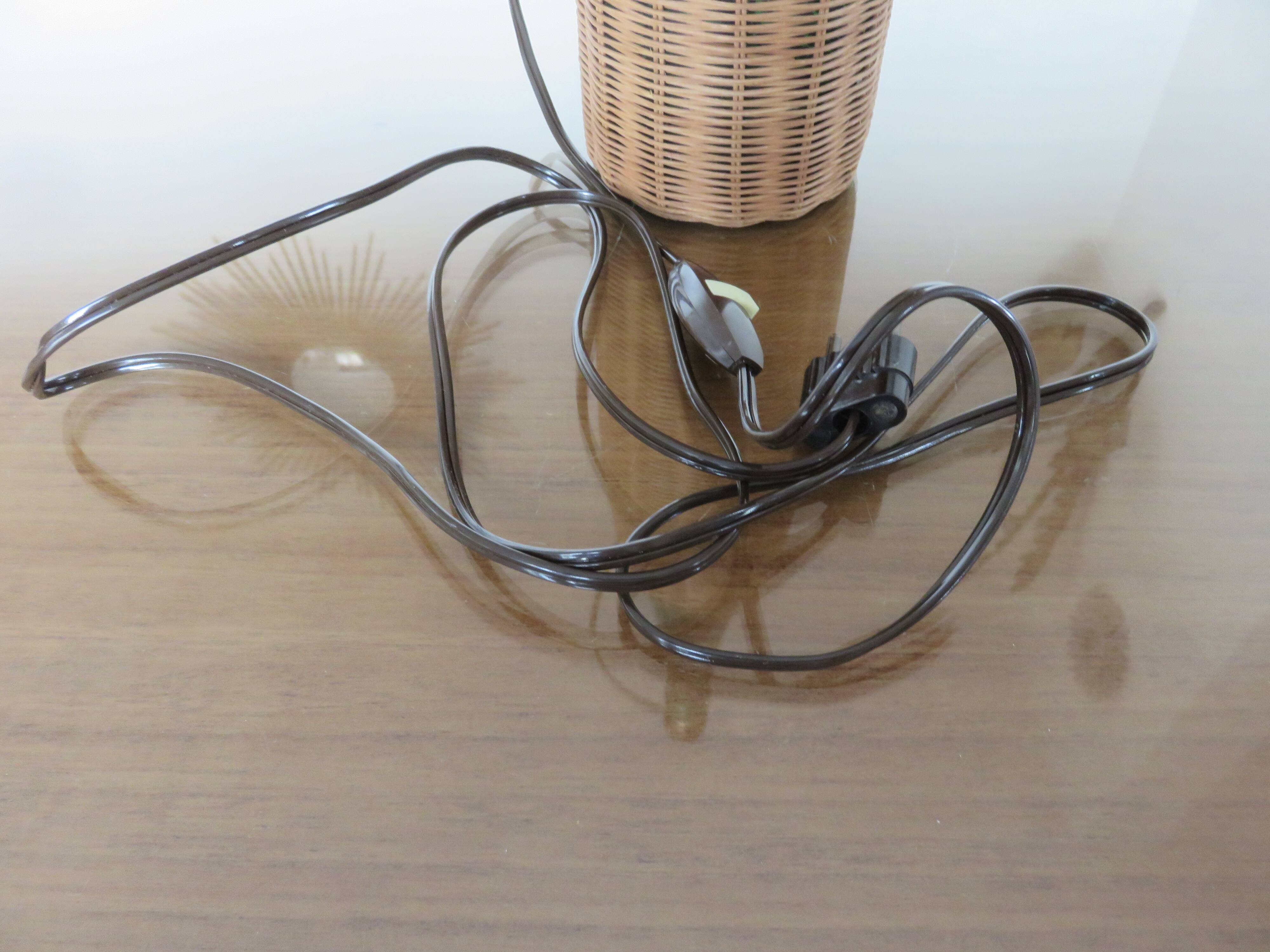 Rattan and glass "bottle" lamp from the 60s and 70s