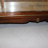 Art Deco period silverware in walnut