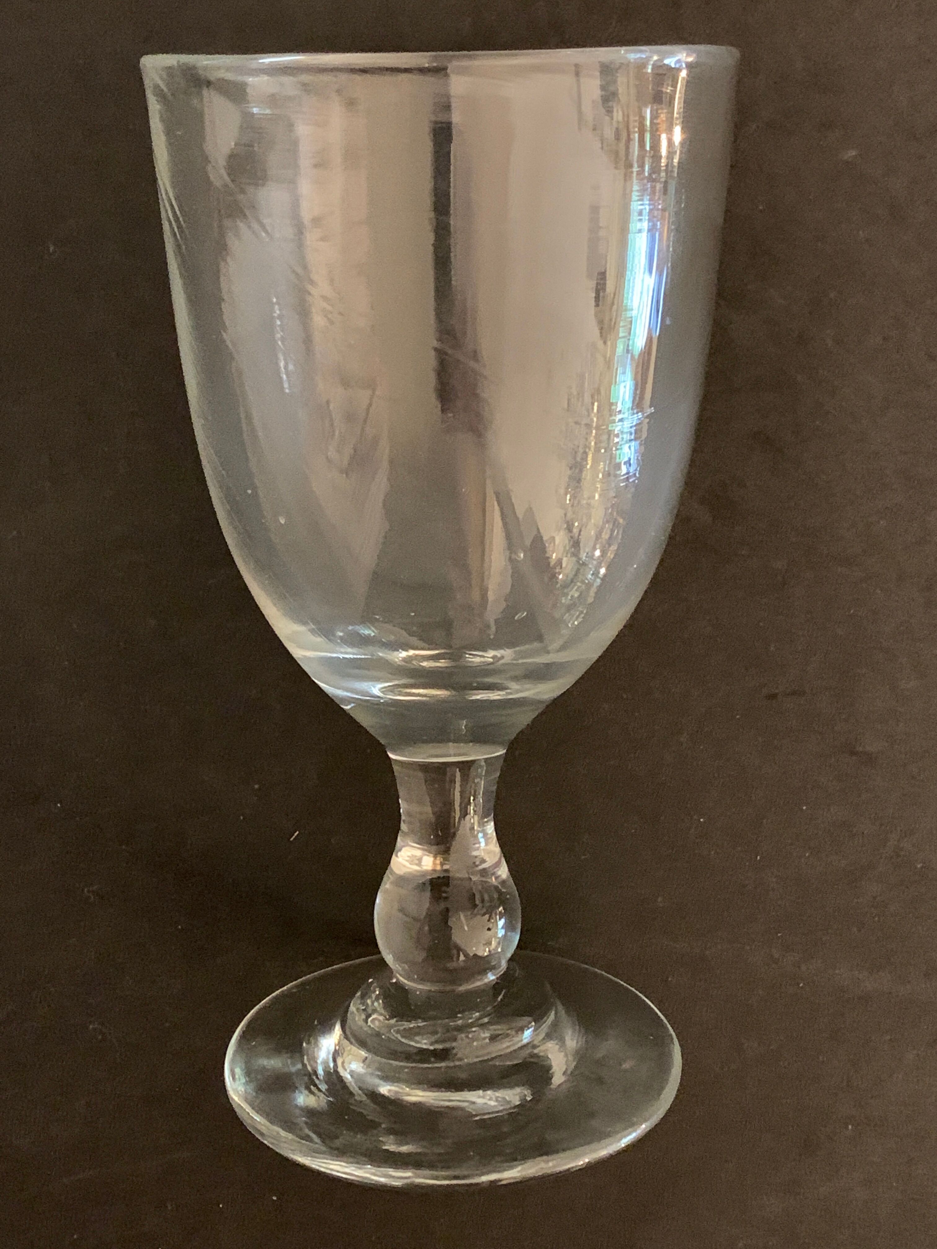 7 antique blown foot glasses