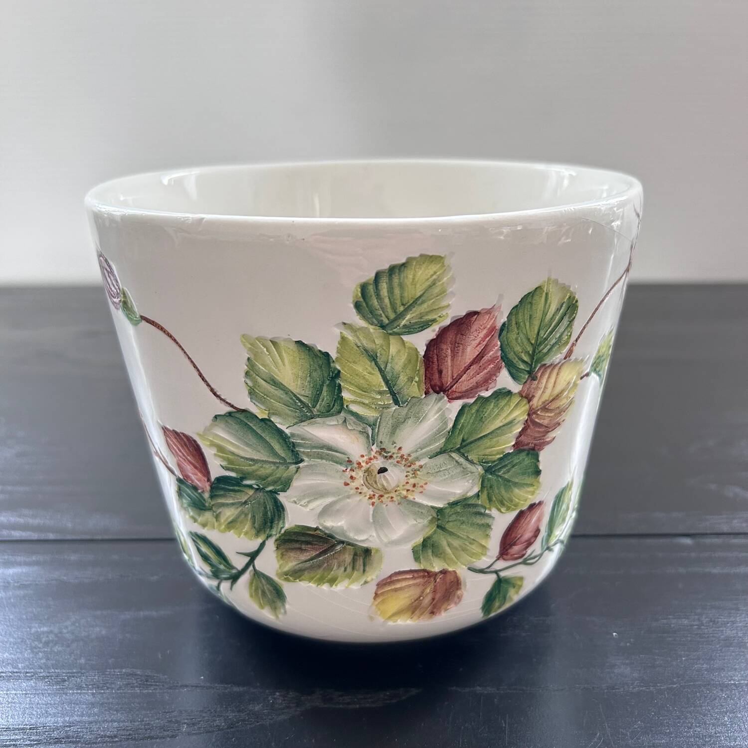 Flower pot with floral decoration in slip