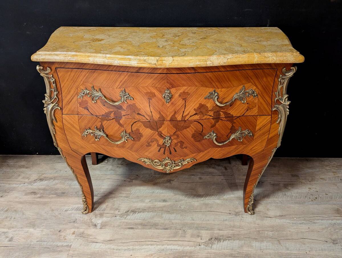 Louis XV style commode with marquetry and its pair of bedside tables.