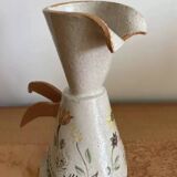 Handcrafted pitcher with floral motif