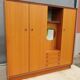 Scandinavian dressing cabinet with round mirror