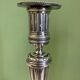 Pair of silvered bronze candlesticks from the 19th century in Louis XVI style signed Voisenet.