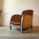 Art Deco club armchair in wood and rust brown velvet, circa 1930.