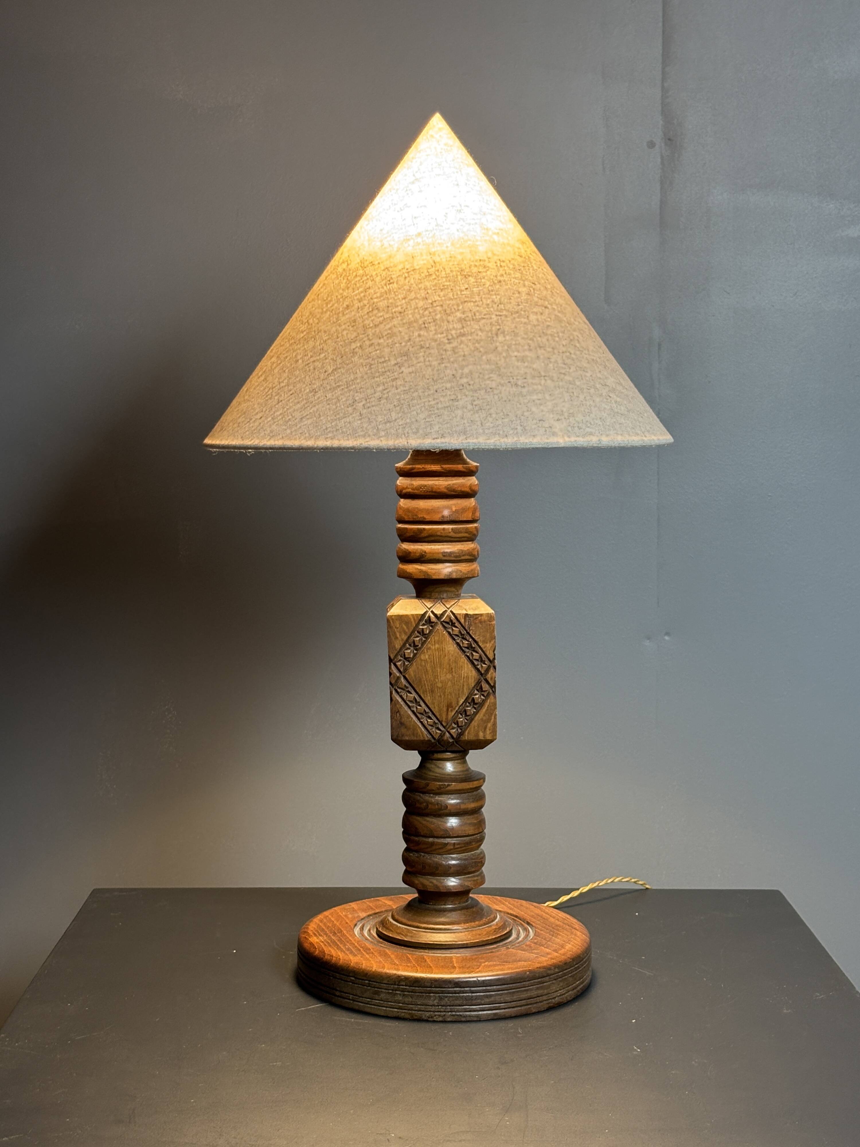 Midcentury brutalist wood turned table lamp in the style of Charles Dudouyt