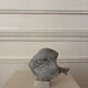 Marble sculpture in the shape of a fish.