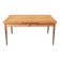 Extendable dining table in light mahogany for 6/8 people.