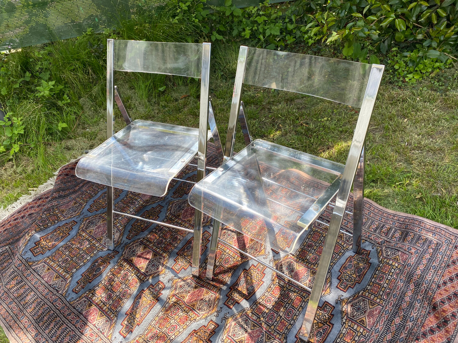 Folding plexiglass chairs