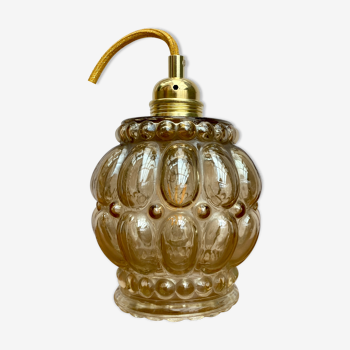 Baladeuse globe vintage en verre ambré