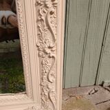 Miroir ancien en bois sculpté