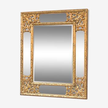 Miroir doré de style régence