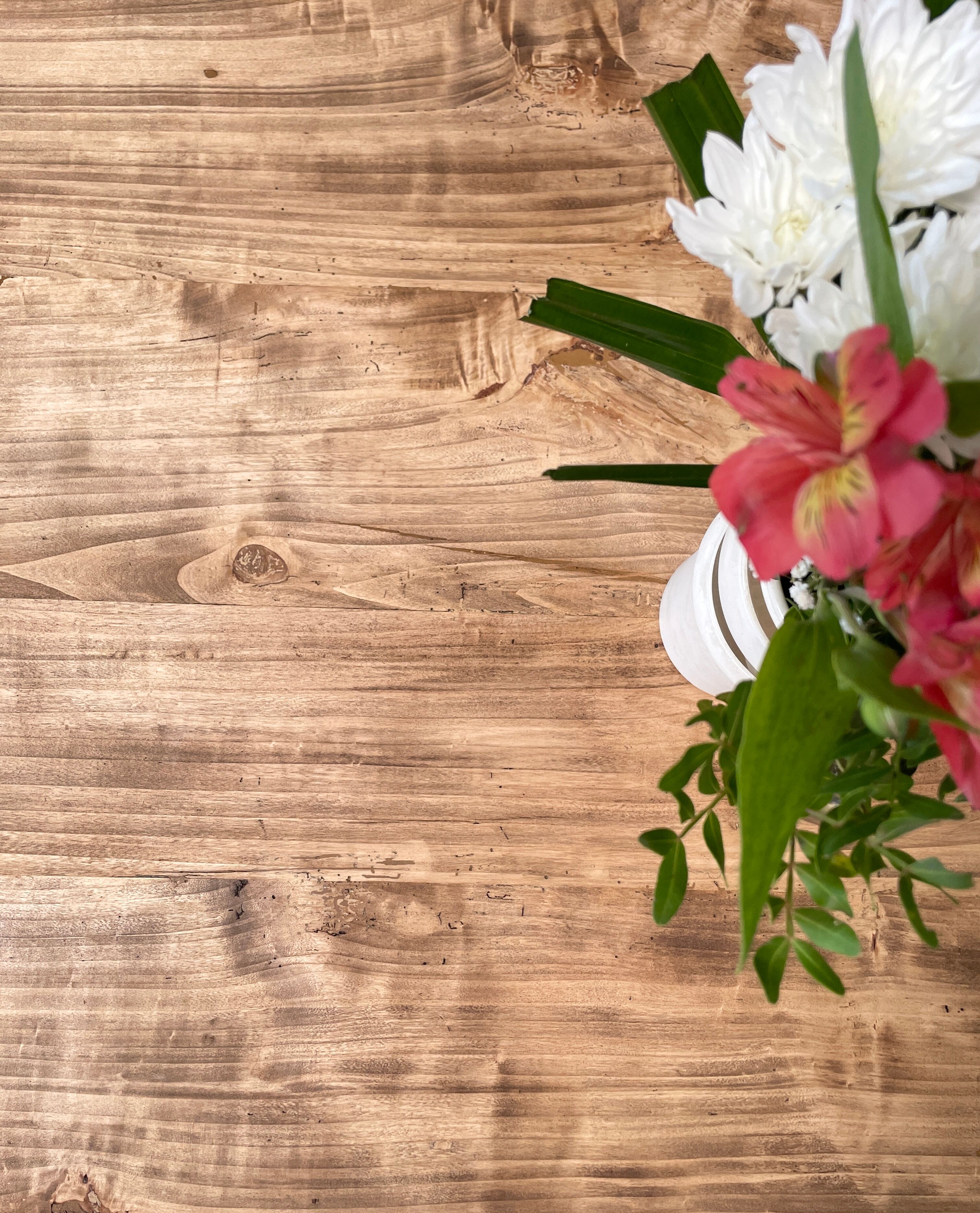 Vintage farmhouse table with turned legs.