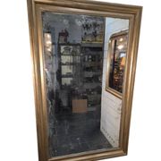 Golden mirror in oak from the 19th century.