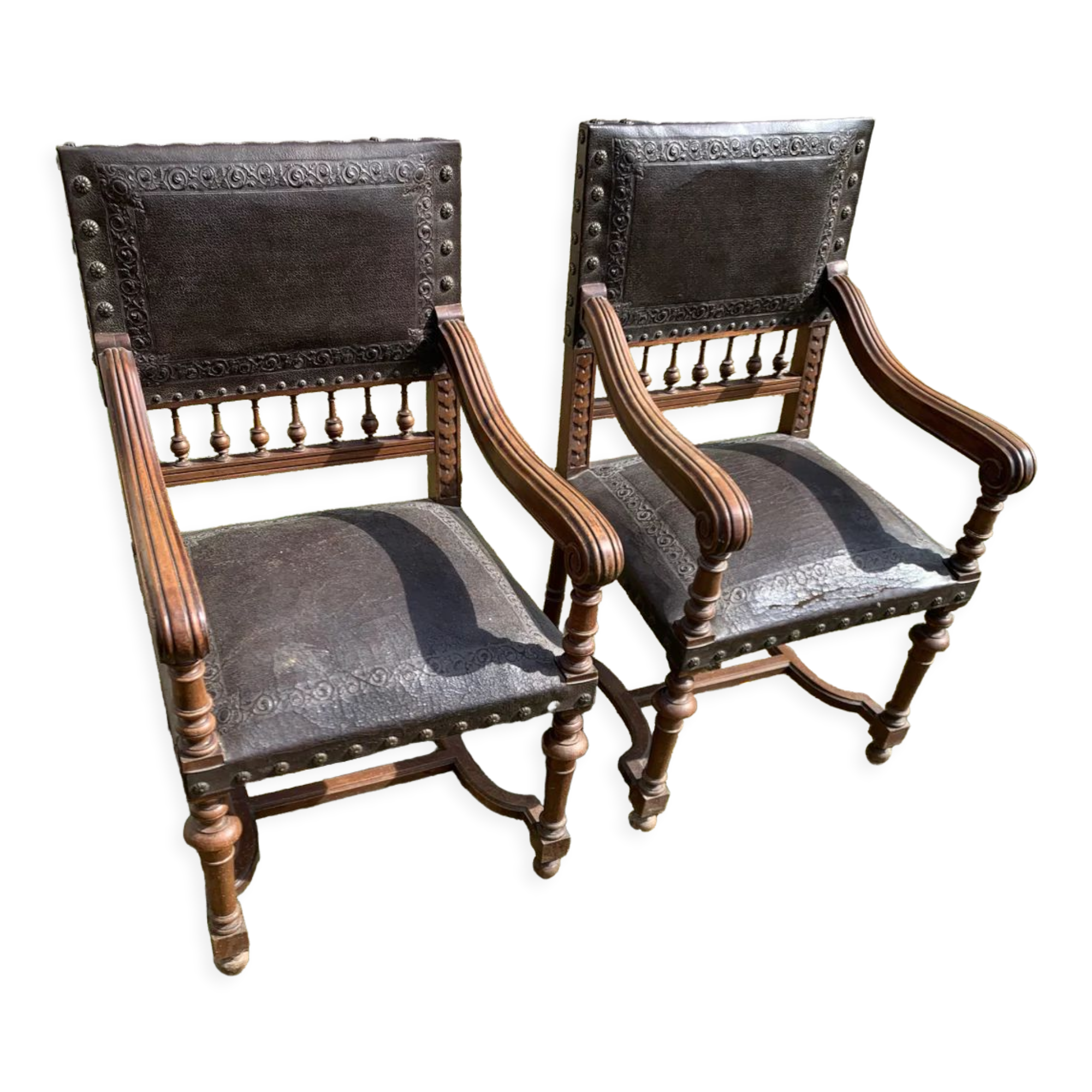Pair of henri ll leather armchairs pushed back end 19 th