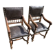 Pair of henri ll leather armchairs pushed back end 19 th