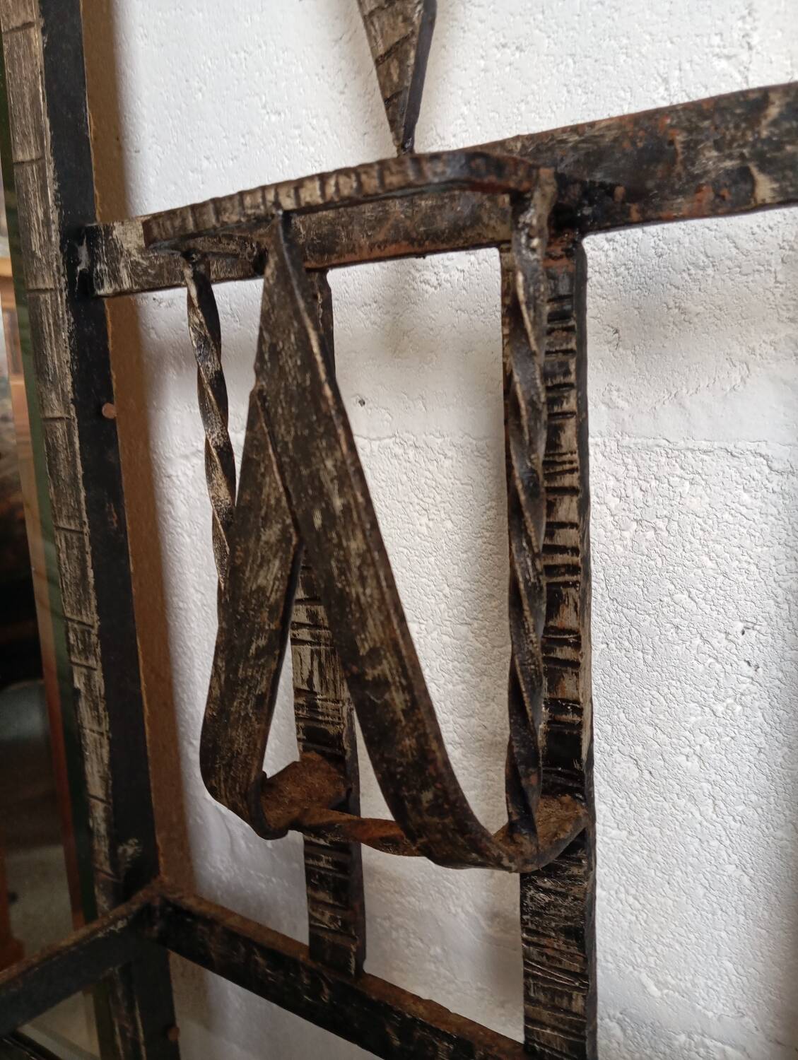 Exceptional and imposing hall wardrobe in hammered wrought iron.