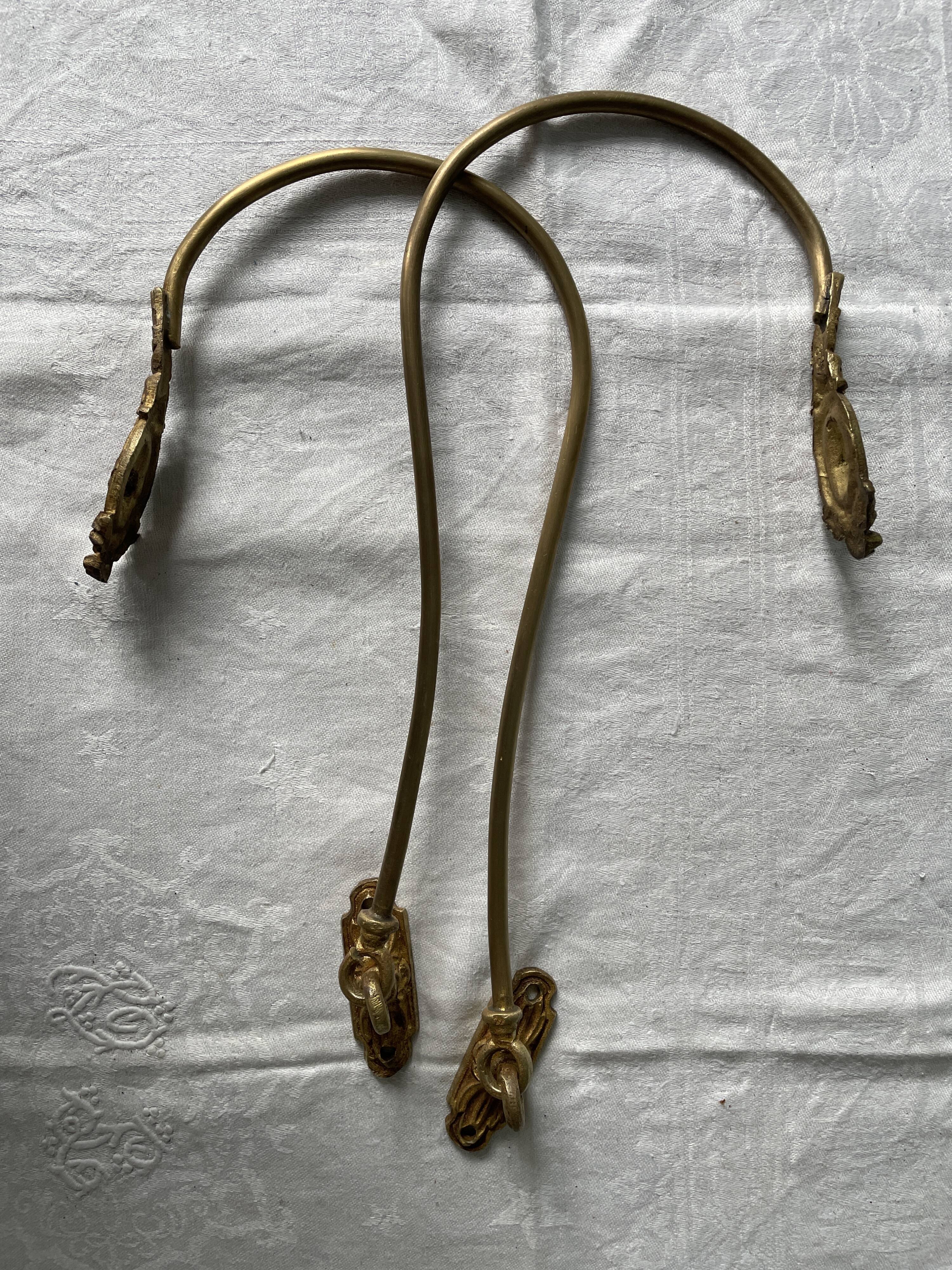 Pair of Napoleon III gilt bronze tiebacks