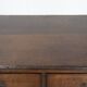 Antique English oak commode dating from the late 18th century.