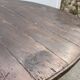 Old folding round winemaker's table with a tilting top.