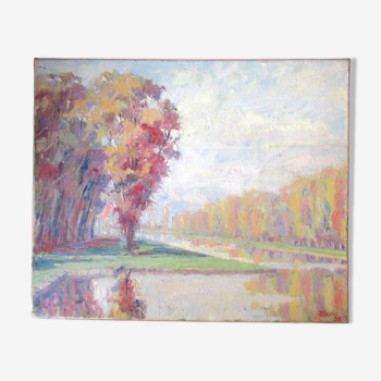 Oil on canvas, depicting a riverside, signed and dated 1938