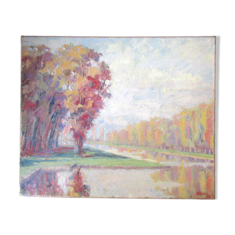 Oil on canvas, depicting a riverside, signed and dated 1938