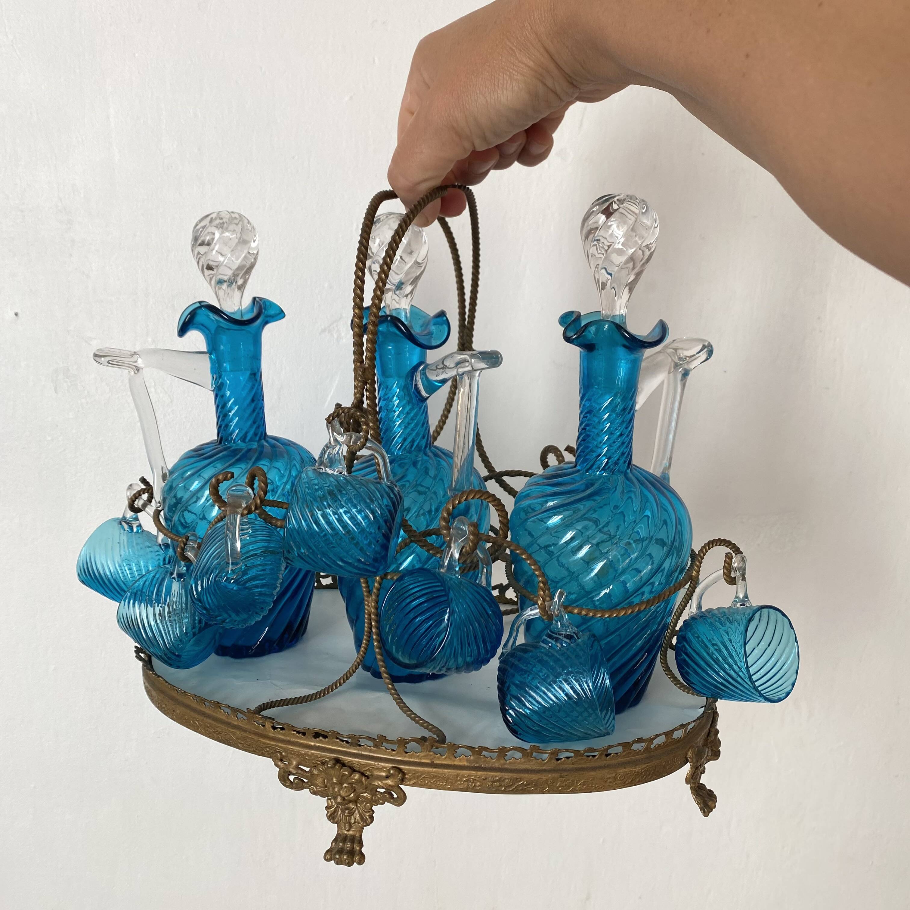 Antique Legras liquor cabinet, decanters and glasses, lion's paw stand